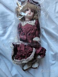 Bambola in ceramica
