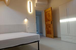 Nuovo, ampio, centrale, con posto auto