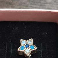 charm pandora stella blu