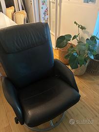 Poltrona in pelle nera reclinabile