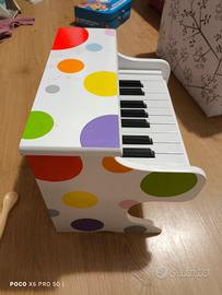 Pianoforte giocattolo elettronico a pallini 