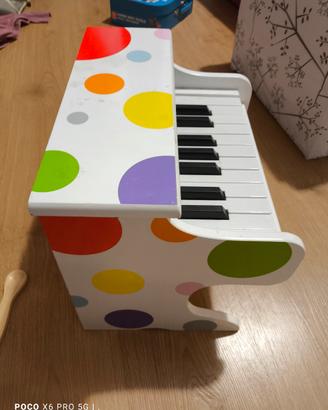 Pianoforte giocattolo elettronico a pallini 