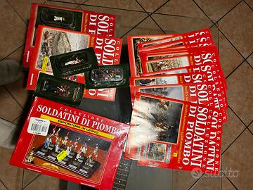 Soldatini di piombo con riviste e espositore