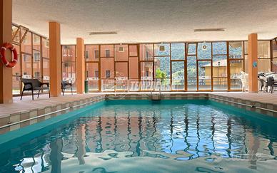 BILOCALE ARREDATO IN RESIDENCE CON PISCINA