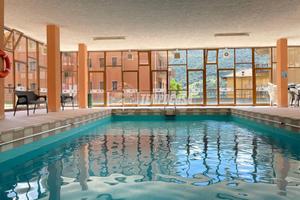 BILOCALE ARREDATO IN RESIDENCE CON PISCINA