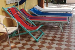 Casa con giardino.anche sdraio per pisolino