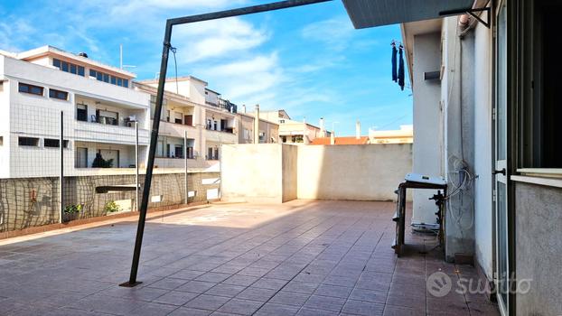 Quadrilocale con Ampia Terrazza a Livello