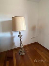 Due candelabri trasformati in piantane e madia