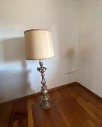 Due candelabri trasformati in piantane e madia
