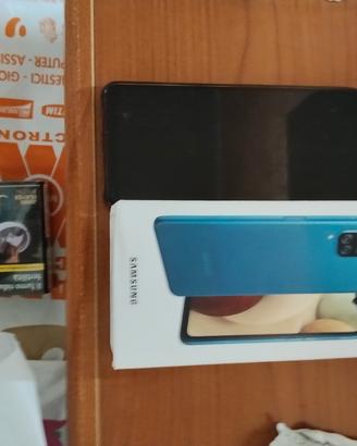 Samsung galaxy A12 con carica batterie 