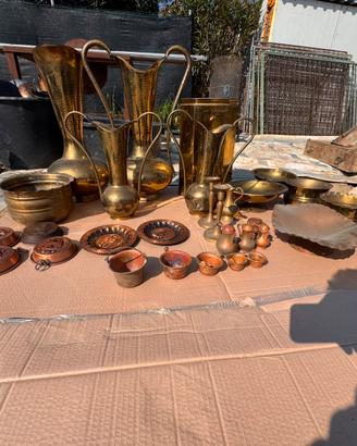Anfore e decorazioni in ottome e rame