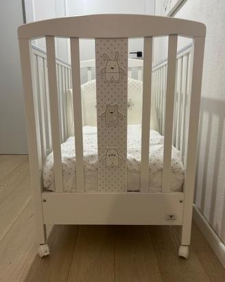 Lettino bimba/o con il set