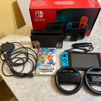 Nintendo Switch +Gioco+Custodia+volanti