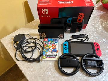 Nintendo Switch +Gioco+Custodia+volanti