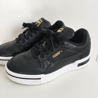 Scarpe sneakers Puma nere con dettagli oro – n.39