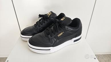 Scarpe sneakers Puma nere con dettagli oro – n.39