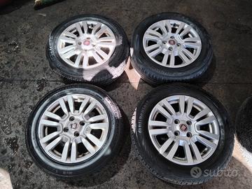 4 cerchi lega e gomme fiat Punto 15P