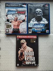 PS2 SMACK DOWN HERE COMES THE PAIN + RAW2007 E DVD