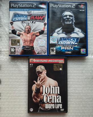 PS2 SMACK DOWN HERE COMES THE PAIN + RAW2007 E DVD