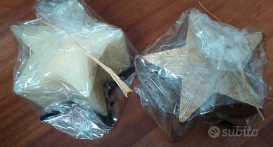 Candele a forma di stella colorate