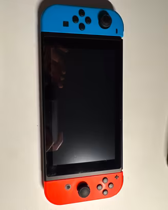 Nintendo Switch + 3 Giochi e Accessori