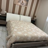 Testiera letto matrimoniale con mobile contenitore