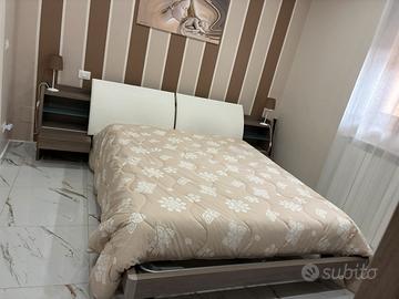 Testiera letto matrimoniale con mobile contenitore