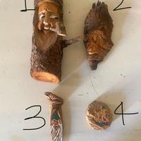 Quattro maschere in legno da collezione