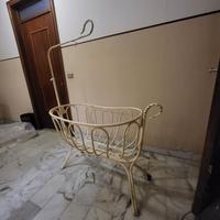 culla in ferro battuto a dondolo