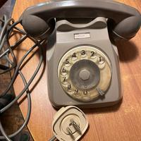 Telefono bigrigio a disco vintage