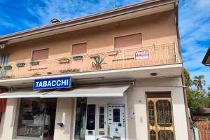 Appartamento+negozio