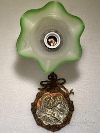 Vecchia applique con immagine in fusione di Cristo