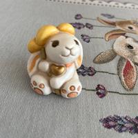 Thun coniglietto con fiore giallo