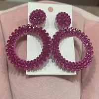 Orecchini pendenti cerchio fucsia con strass