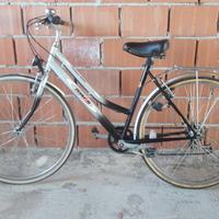 Bicicletta con cambio e ruote scorrevoli revisiona