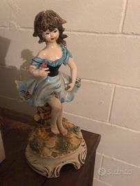 Statua bambina capo di monte