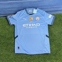 Maglia Manchester City 2024 con patch originali
