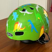 Nutcase Casco Baby Nutty Dino Mite Gloss XXS