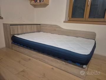 Letto una piazza e mezzo con contenitore  e doghe 