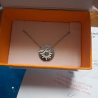 Collana con sole e pietra azzurra. 