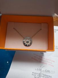 Collana con sole e pietra azzurra. 