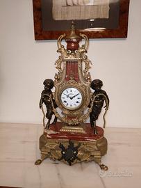 Tris antico orologio Lorenz e candelabri