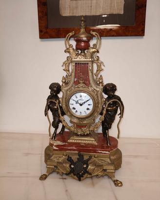 Tris antico orologio Lorenz e candelabri
