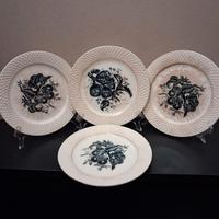 Serie di 4 piatti da dolce in ceramica decorata