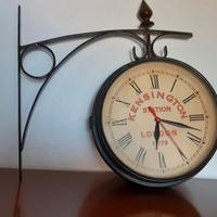 Orologio da parete bifrontale in acciaio