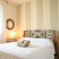 Camera matrimoniale in legno e ferro battuto