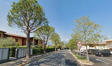 2locali arredato con giardino e posto auto