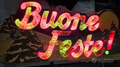 scritta Natale con luci a pisellino