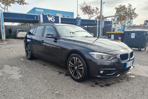 BMW 318d touring auto.