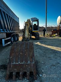 New holland E 245 2005